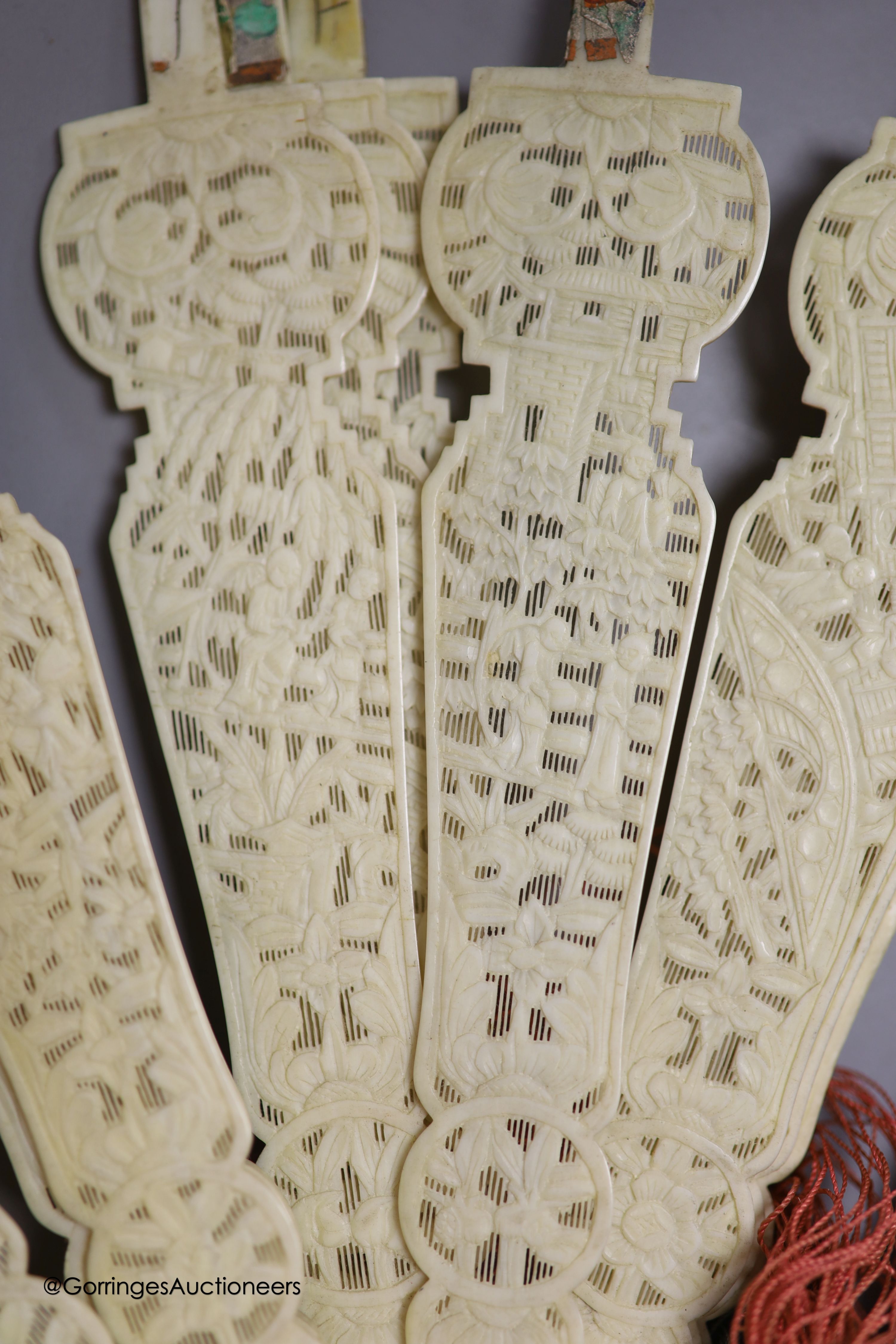 A 19th century Canton ivory and painted paper fan, in need of restoration